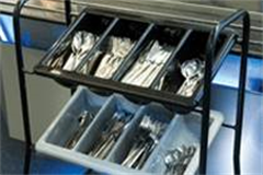 A cutlery box box filled with various types of cutlery